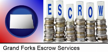 the concept of escrow, with coins in Grand Forks, ND